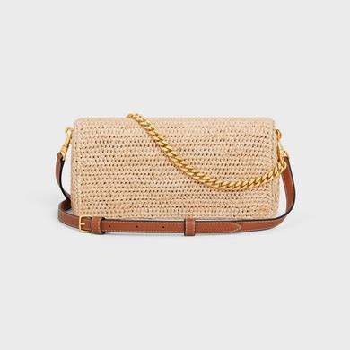 Women's Multipochette in raffia .